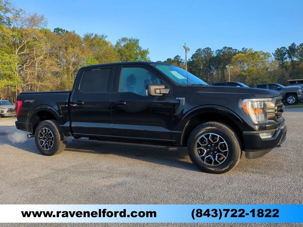 2022 Ford F-150 XLT in Agate Black Metallic — front three-quarter view
