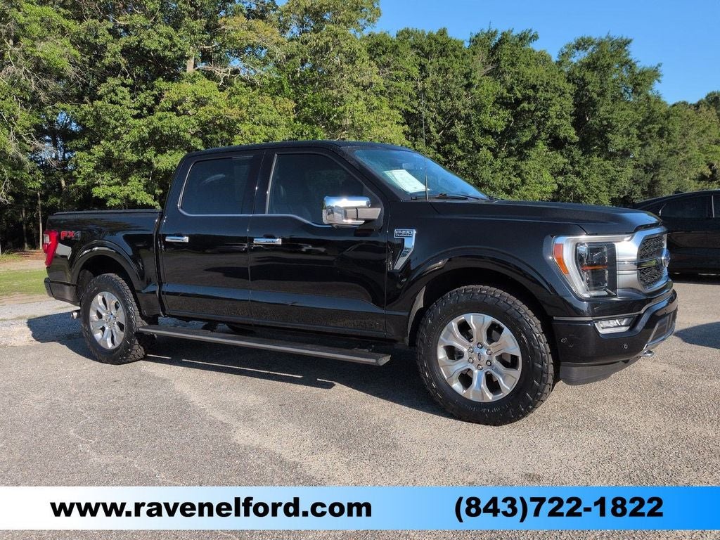 2023 Ford F-150 Platinum in Agate Black Metallic — front three-quarter view